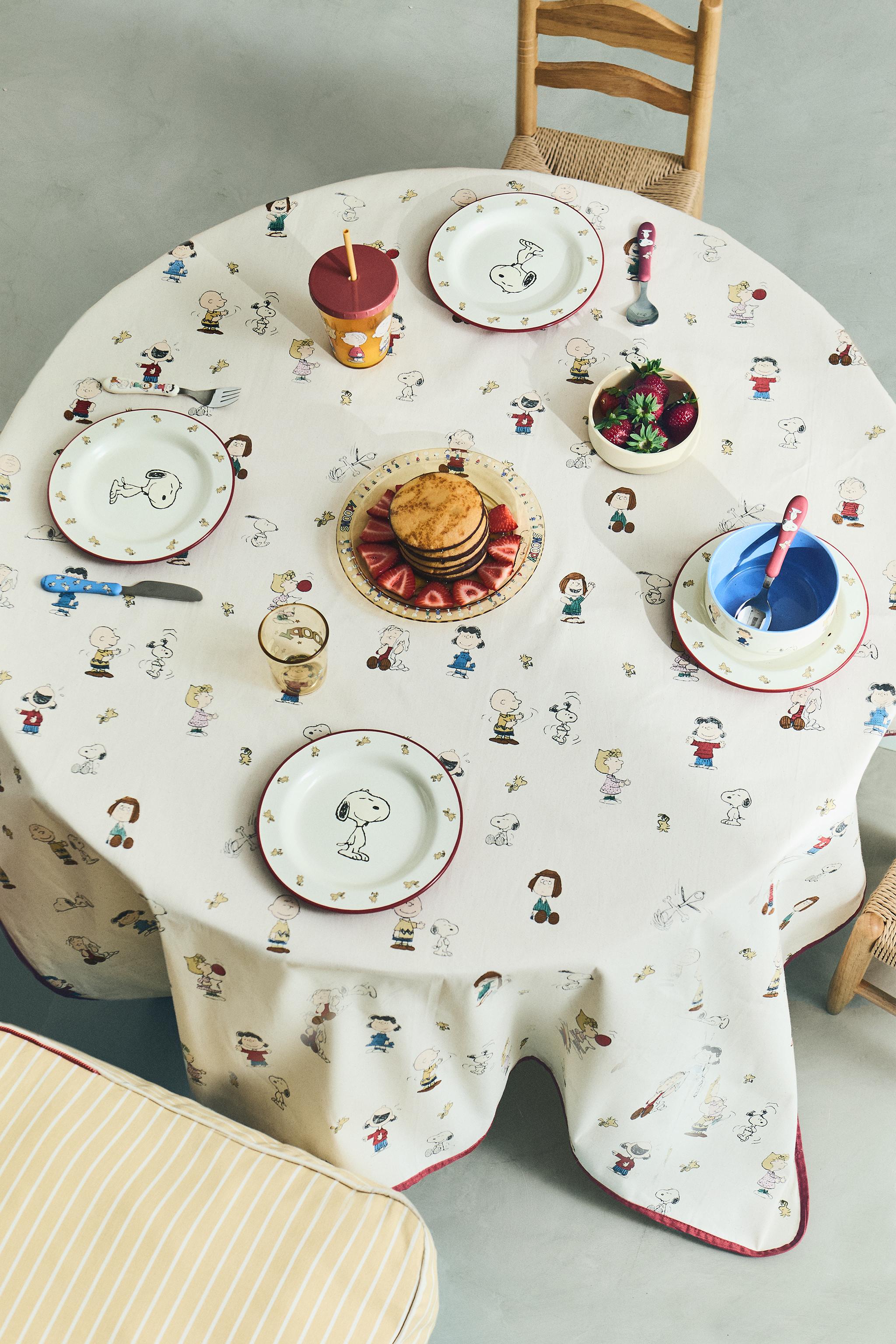 CHILDREN’S PEANUTS™ RESIN-COATED TABLECLOTH